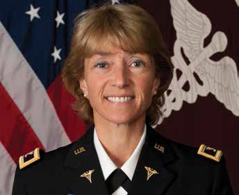 Felicia Pehrson in uniform smiling at the camera