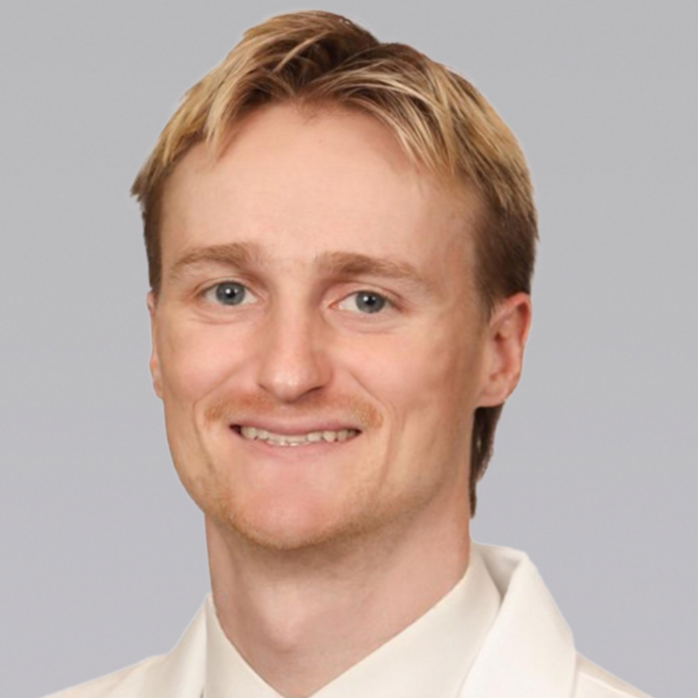 man with blond hair and mustache
