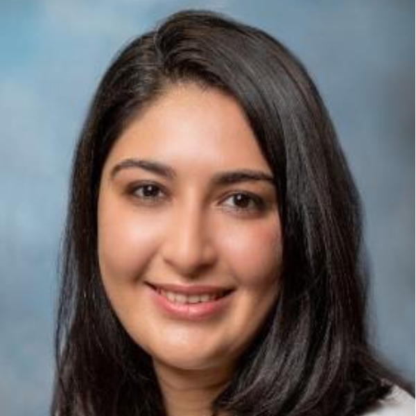 Headshot of Seher Banu Farabi Atak smiling.