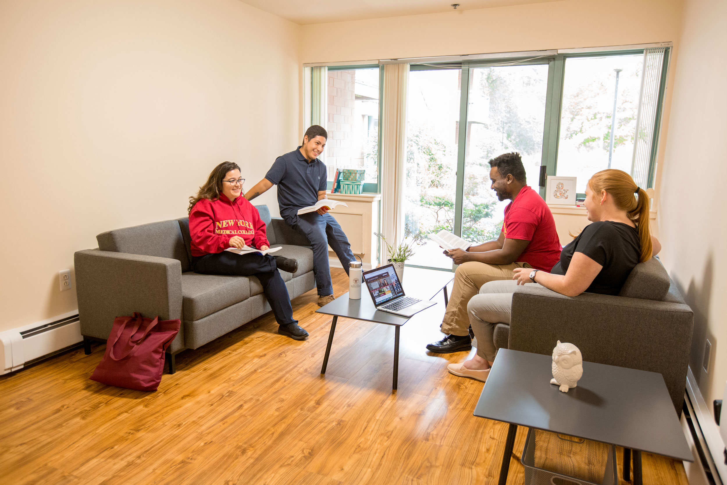 Four students sitting on couches in Grasslands II