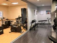a photo of the fitness center and dance studio with exercise equipment