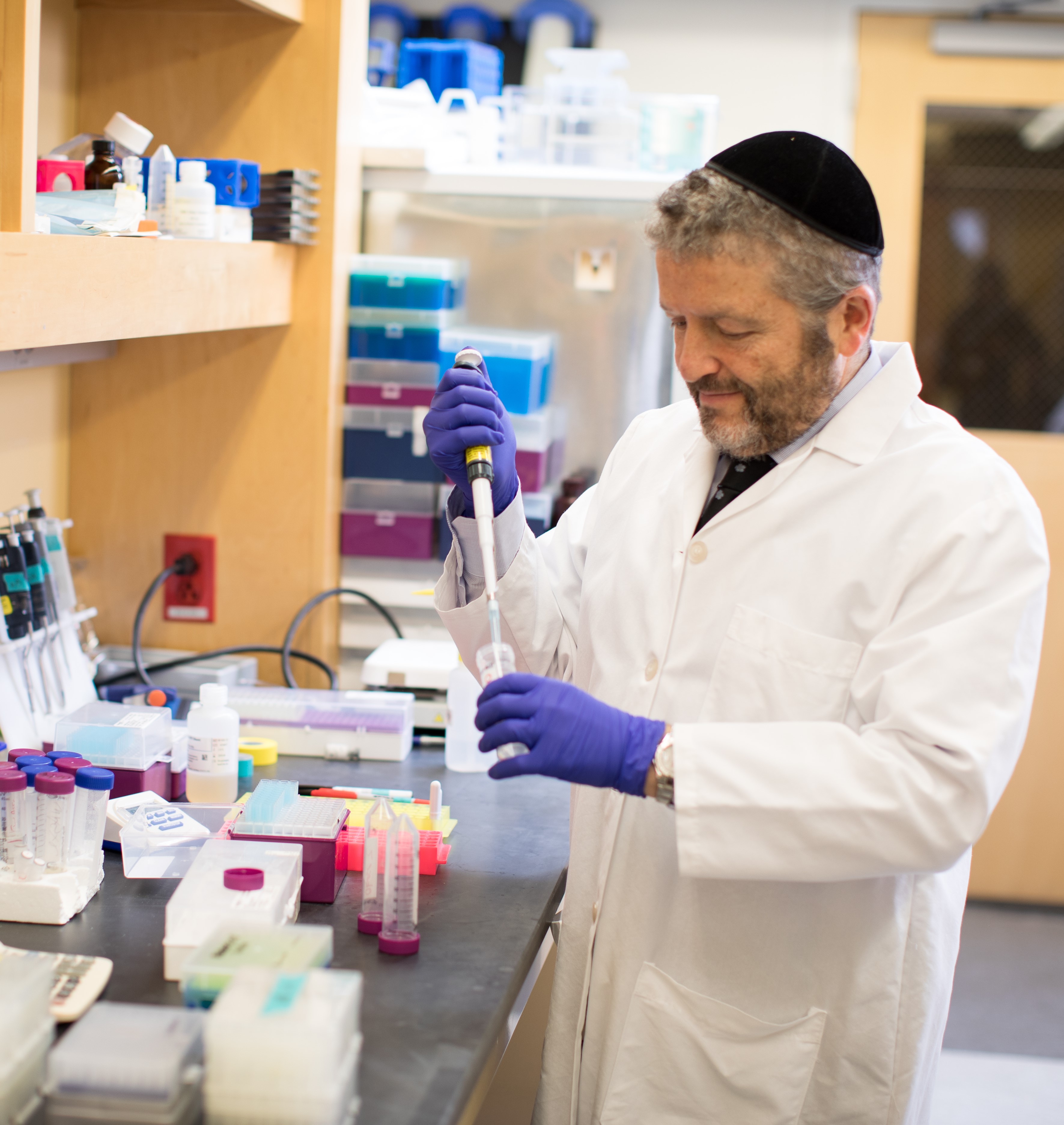 Dr. Salomon Amar working in lab