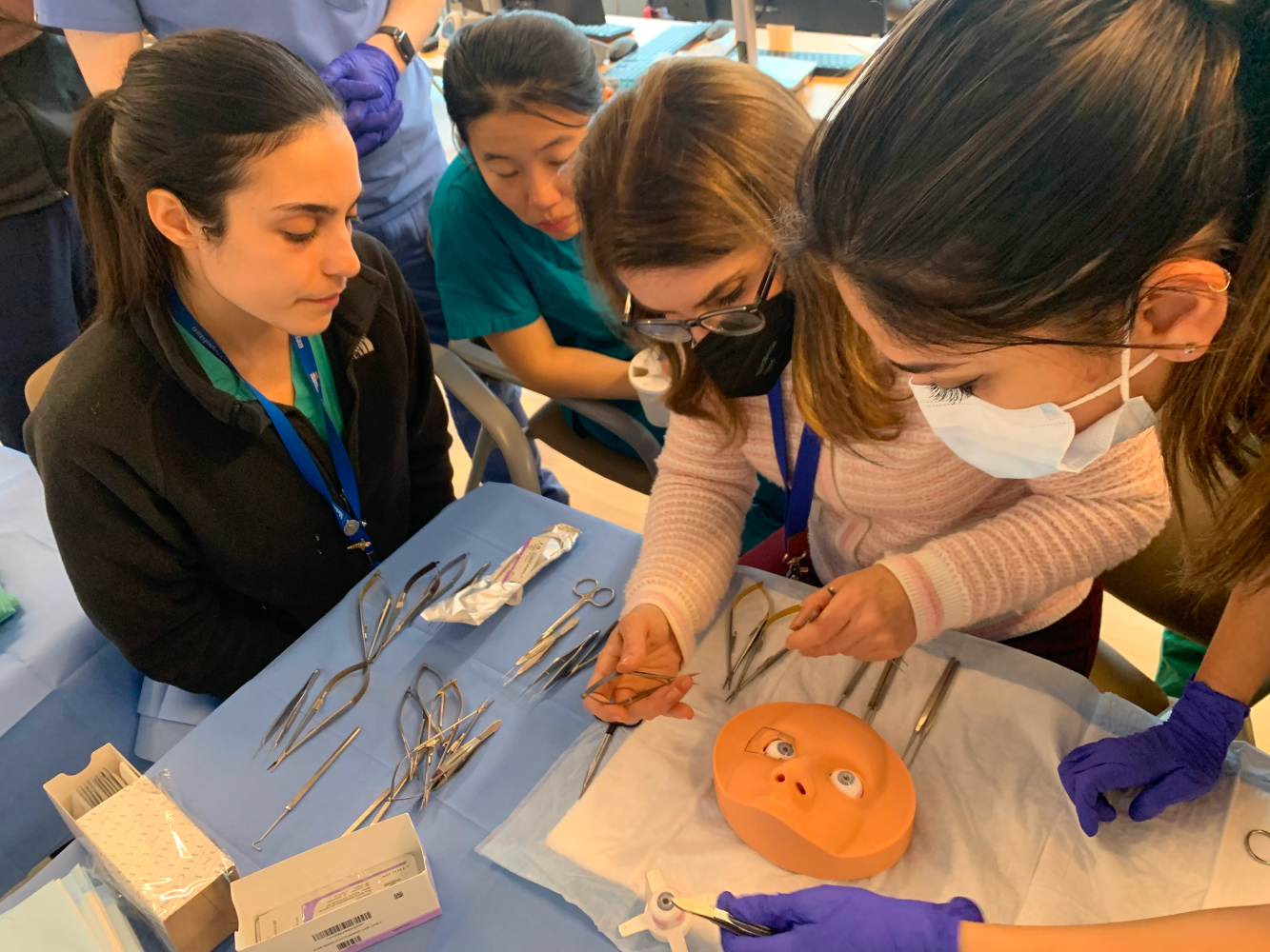 Residents developing surgical skills using tools in wet labs