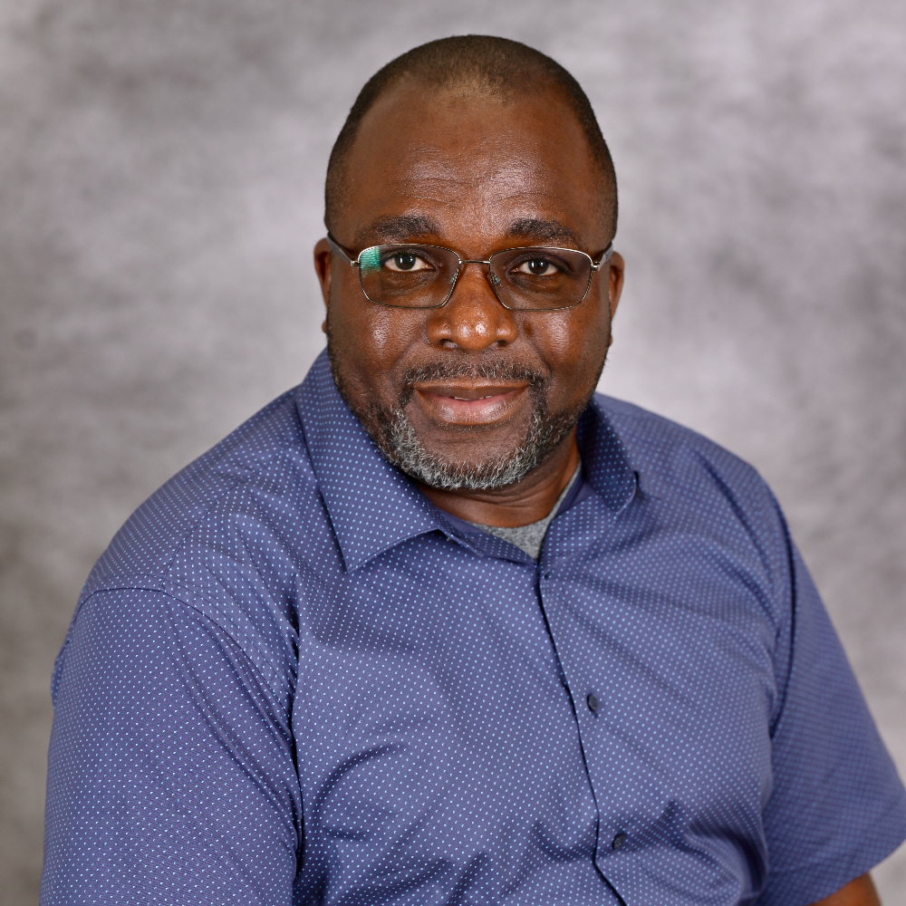 Headshot of Kola Adegoke