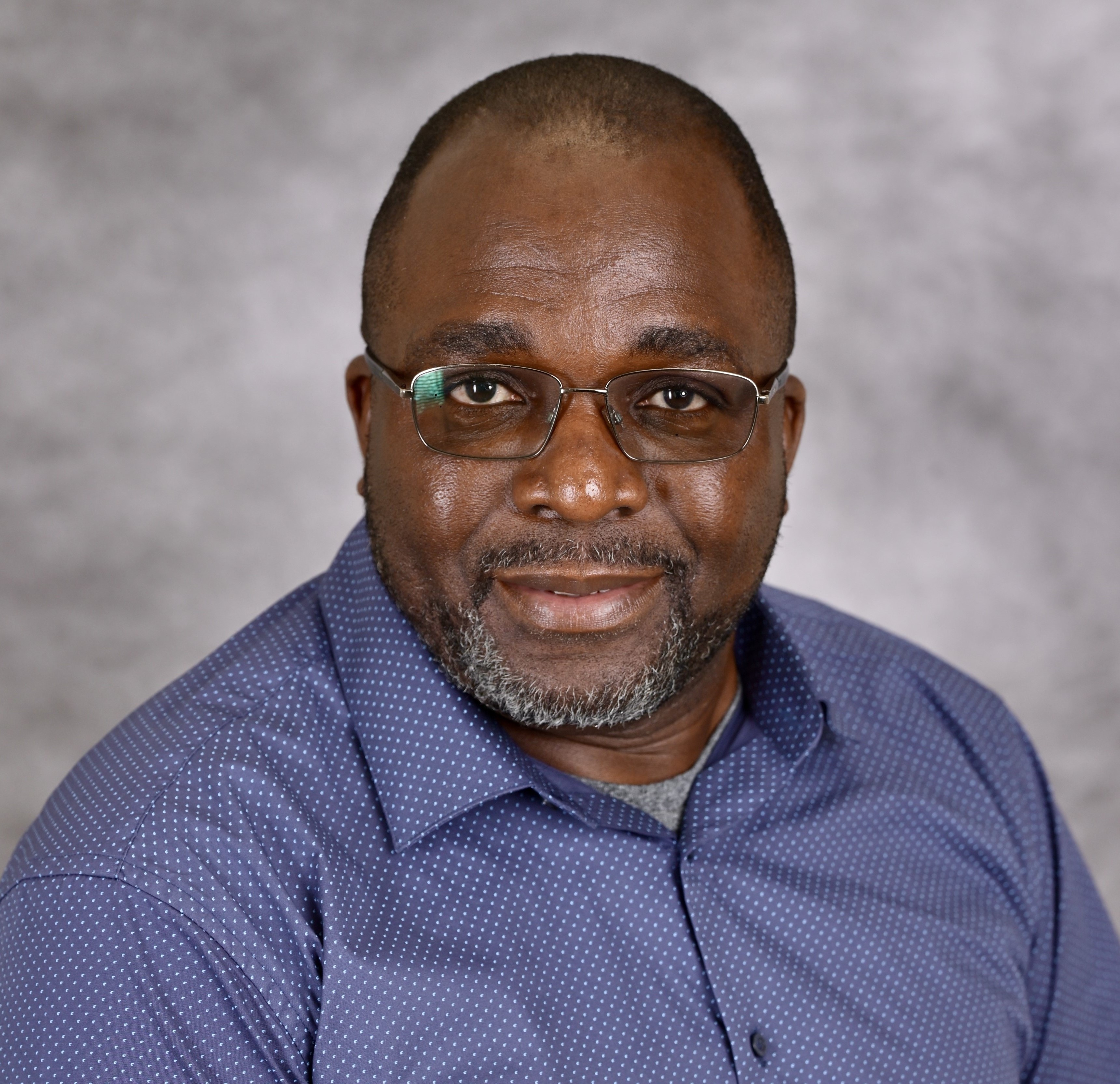 Headshot of Kola Adegoke